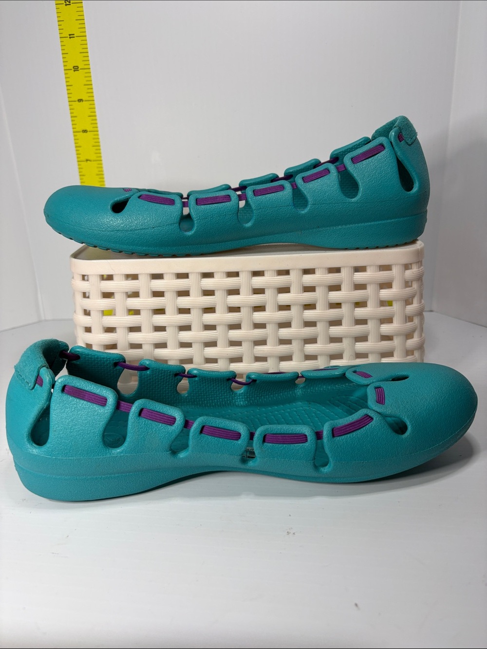 Crocs size 7 Women’s Teal Slip-On‎ Flats with Purple Accent Detailing. Box 27